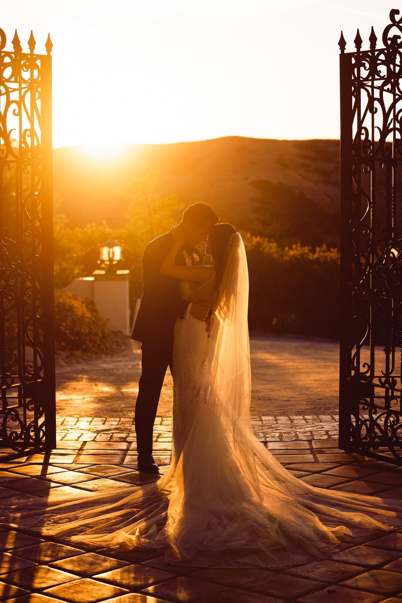 Stephanie and Lauro sharing a sunset portrait at Hummingbird Nest Ranch