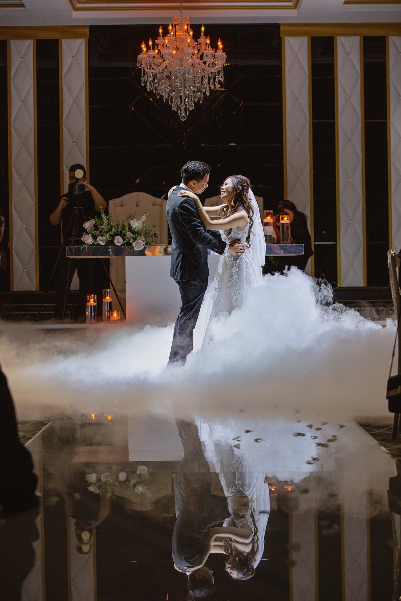 The Tran wedding couple dancing in low fog