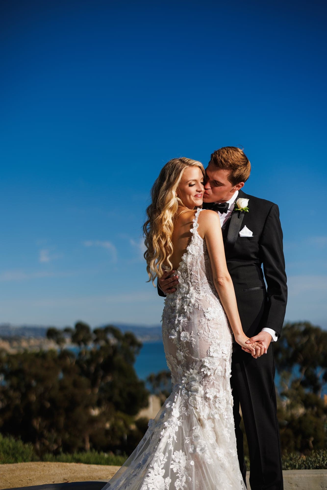 Danielle and Eric overlooking the Dana Point coast on their wedding day