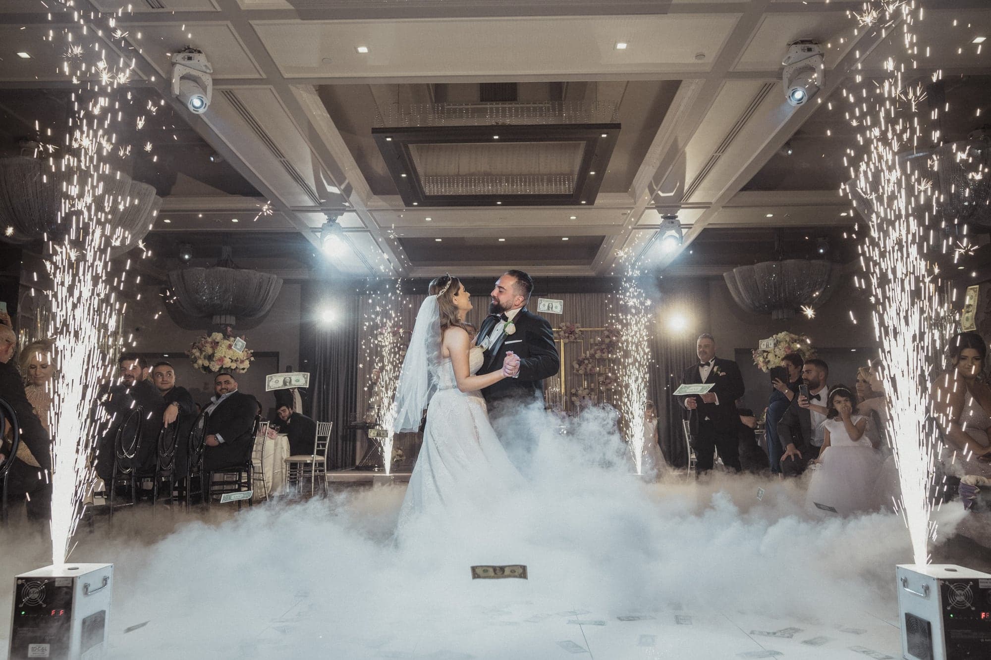 Greg and Marine dancing between cold spark fountains and low fog at Legacy Ballroom in Glendale, photographed by Michael Anthony Photography