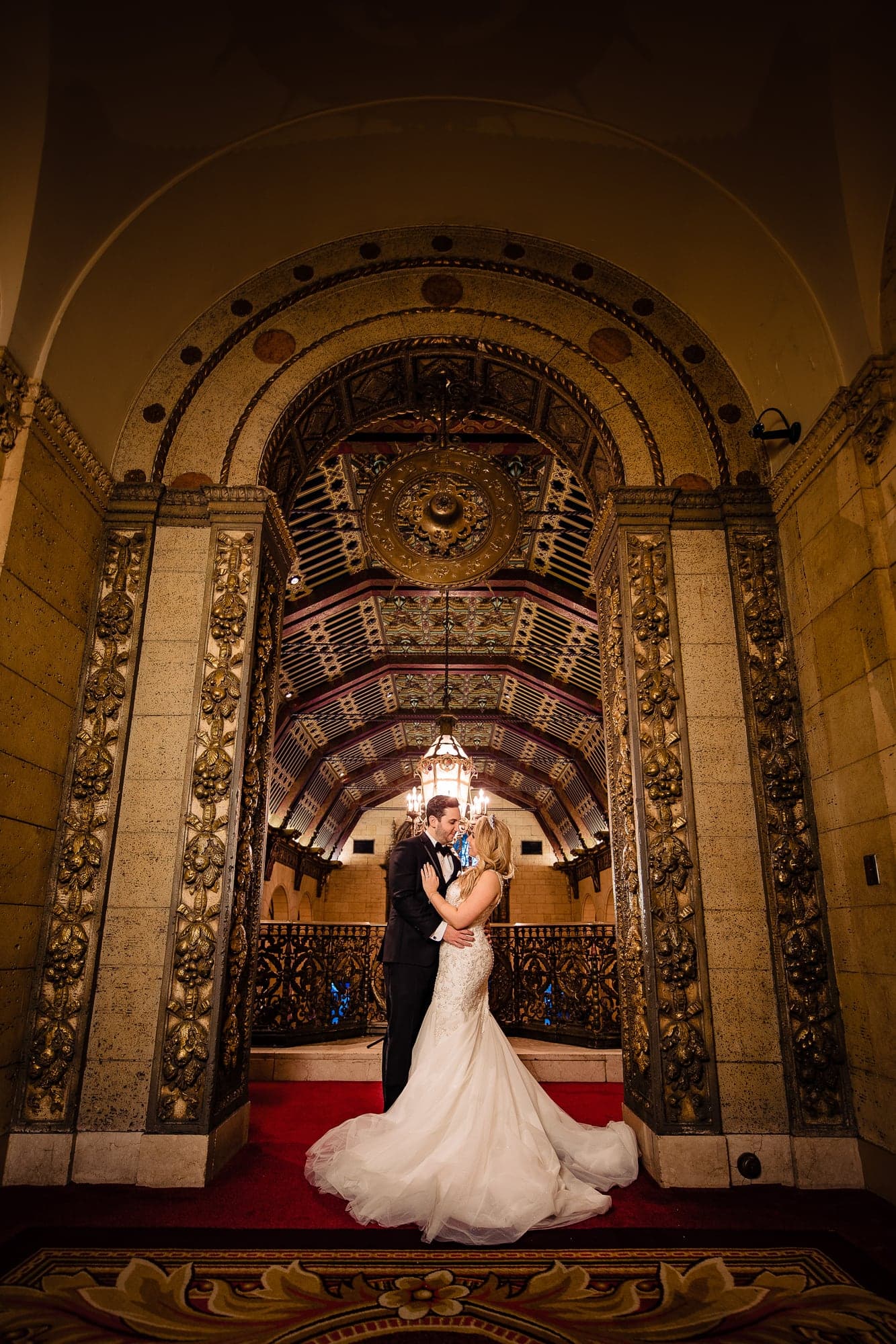 Samantha and Michael beneath the ornate Millennium Biltmore ceiling