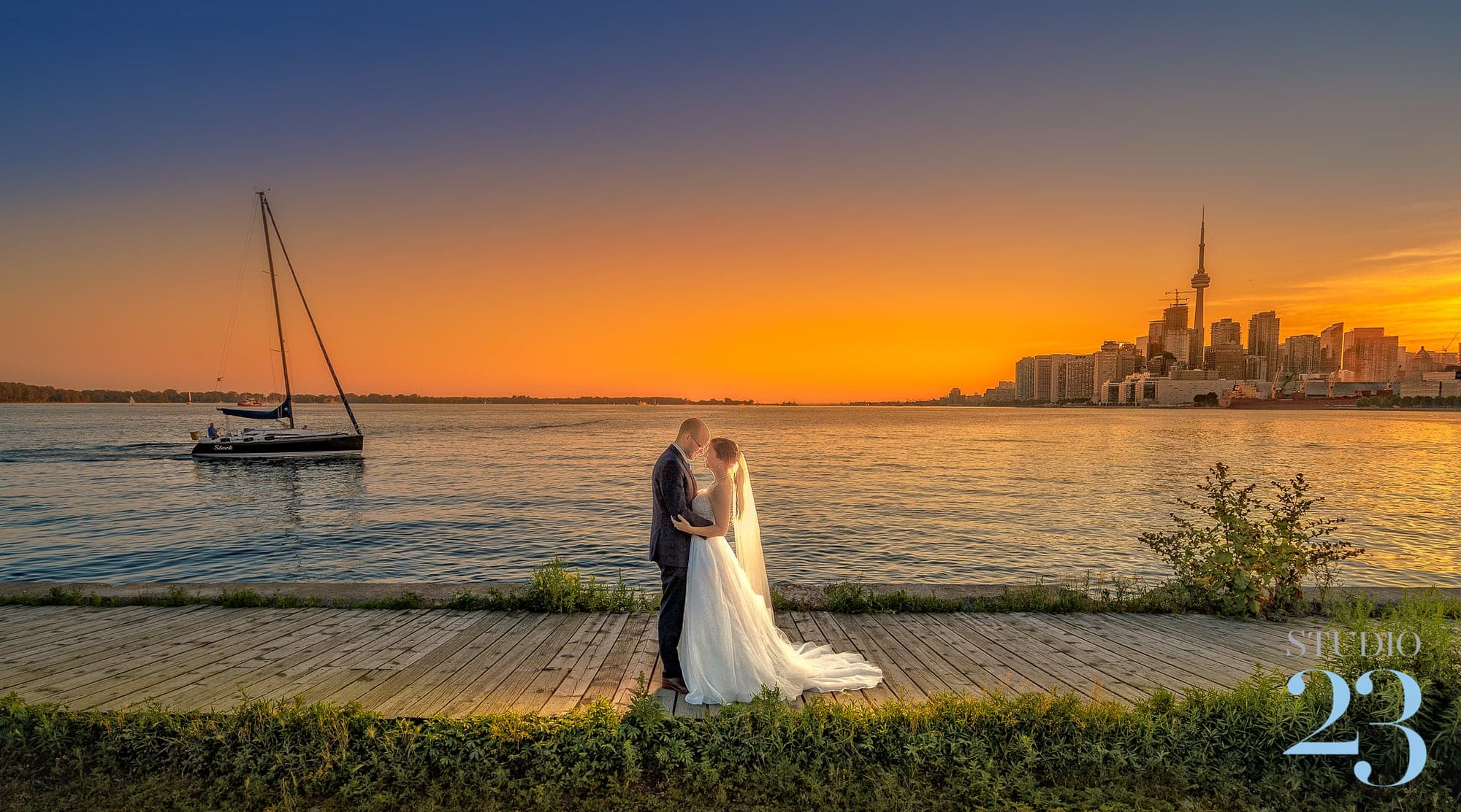 The Carter couple at sunset with the Toronto skyline across the water