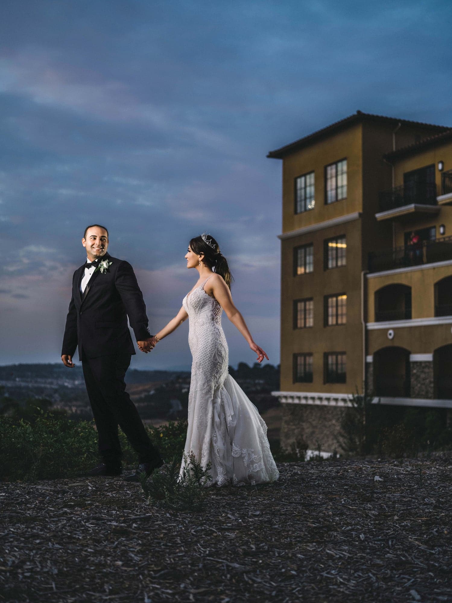Nataly and Tasier embracing at sunset near The Westin Carlsbad
