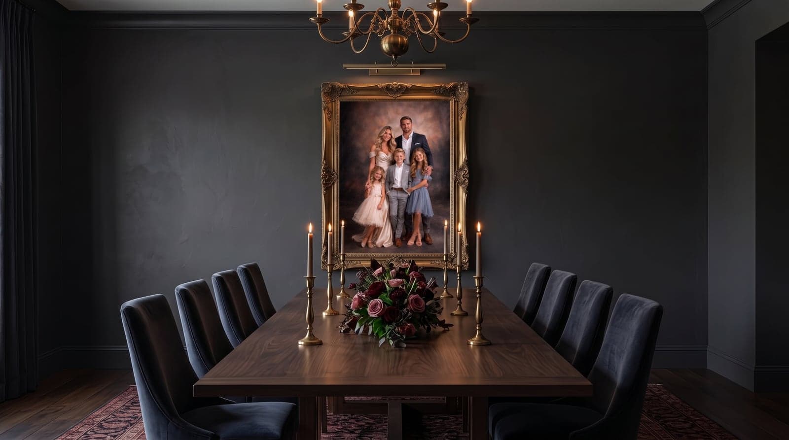 Gold-framed family portrait beneath a brass chandelier in a formal dining room