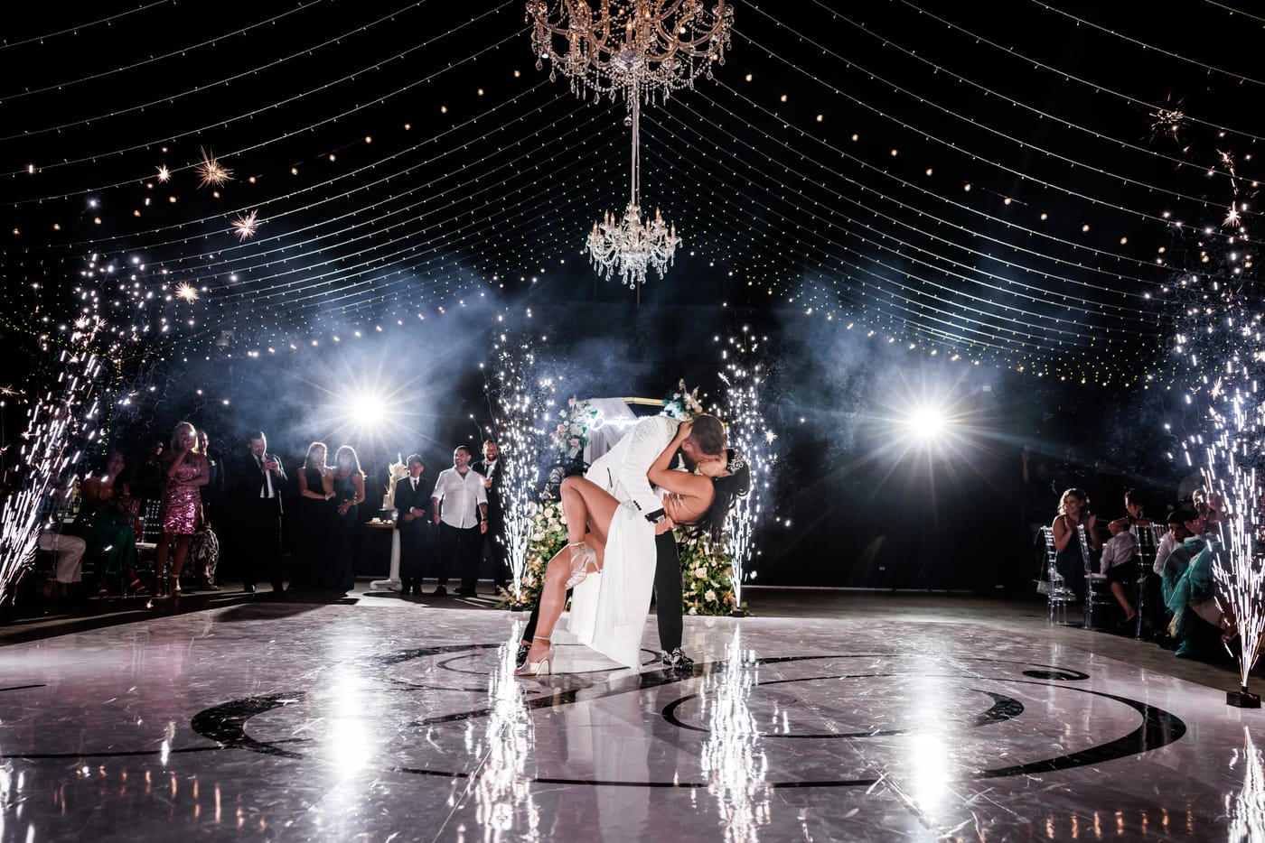A dramatic first dance beneath chandeliers and fireworks at The Cape Cabo