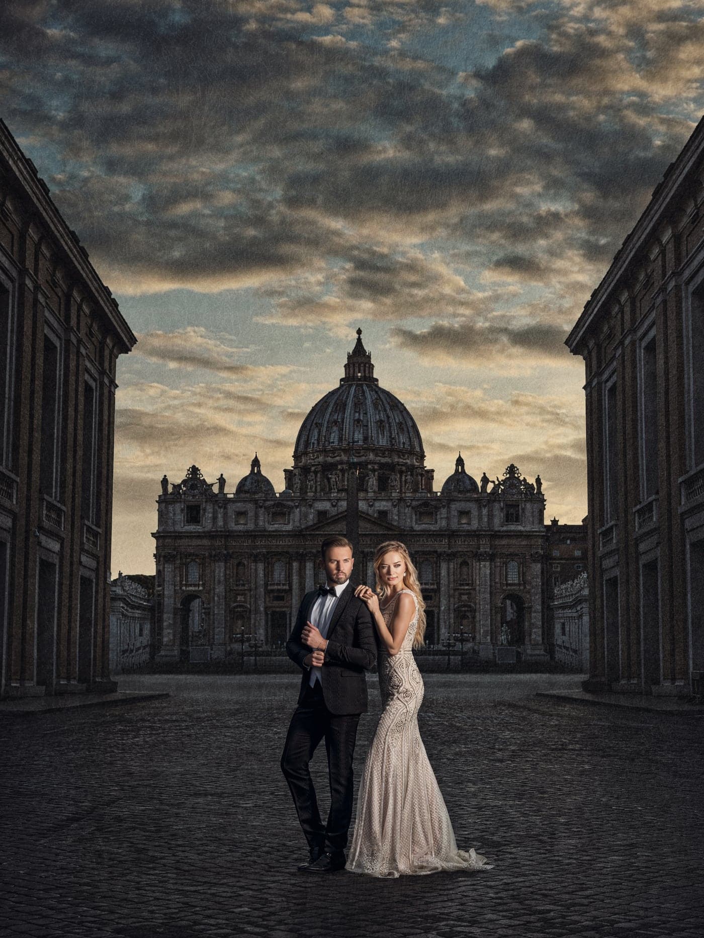Bride and groom before St. Peter's Basilica at dusk, Rome