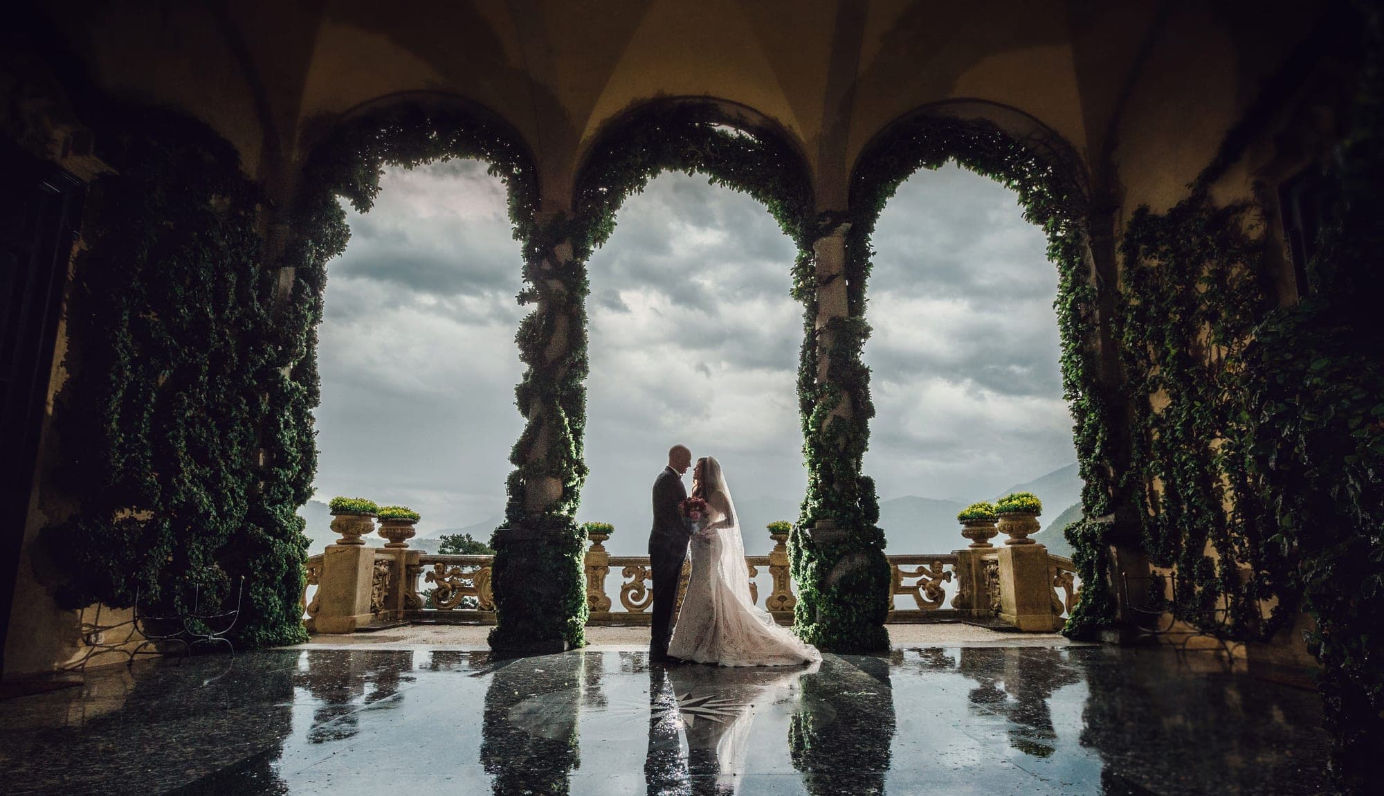 A bride and groom photographed in soft late-day light on their wedding day, part of a full-day coverage plan booked more than a year in advance.